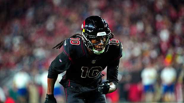 Cardinals DeAndre Hopkins (10) comes off the line against the Saints during a game at State Farm Stadium in Glendale on Oct. 20, 2022.